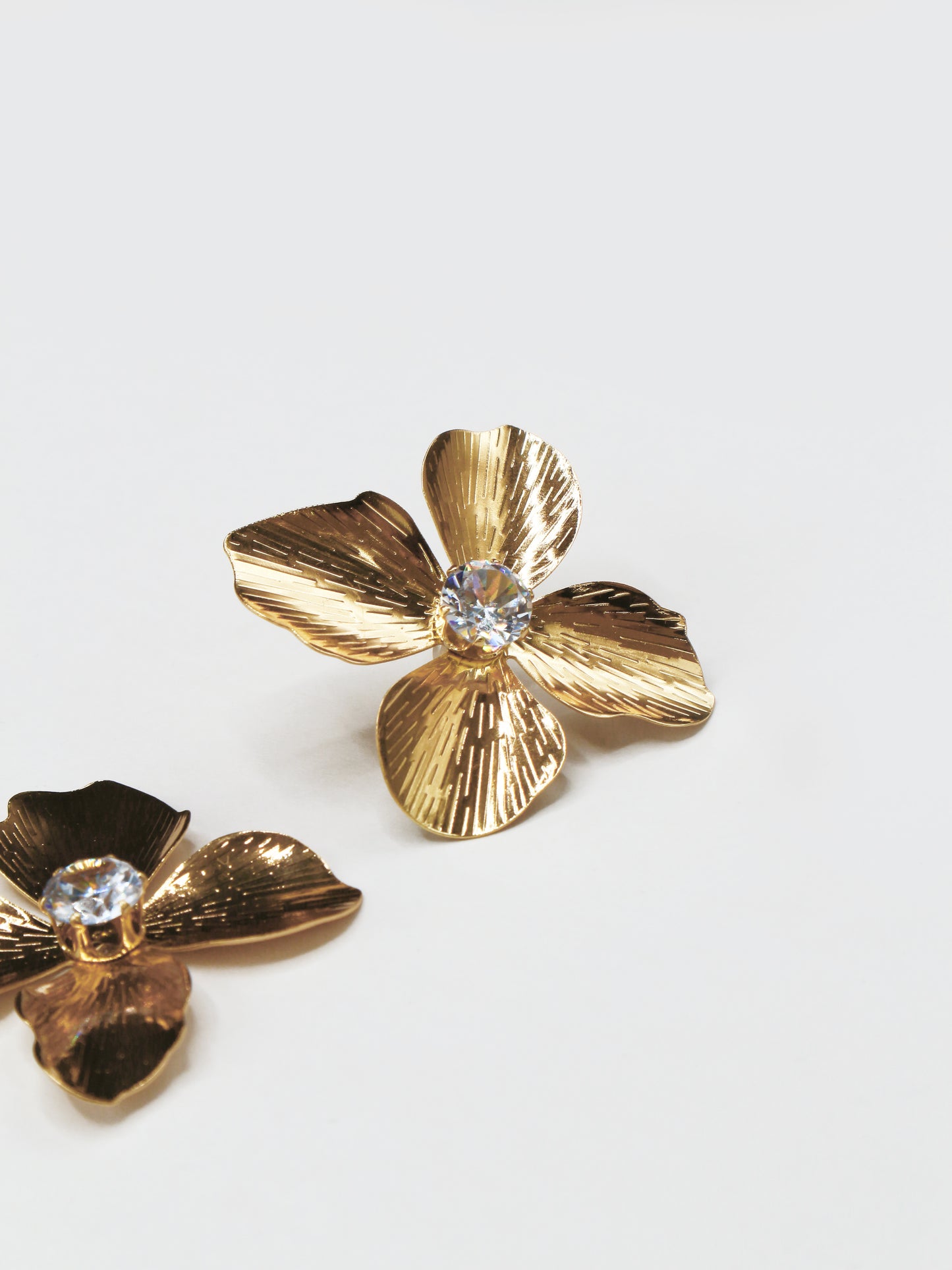 BRINCOS FLOR DIAMANTE
